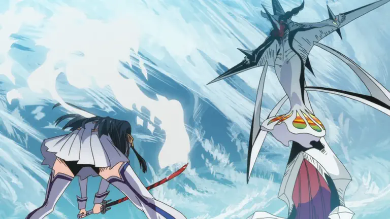 Ragyo impaled through the hands and chest on the Honnouji Academy emblem-